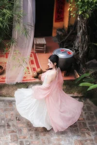 Ethereal Muse in Traditional Silk and Ancient Architecture - image 1