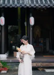 Elegant Vietnamese Beauty with Flowers - image 14