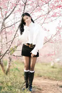 Elegant Beauty Amidst Blooming Cherry Blossoms | A Gentle Girl Evoking Fresh Spring Emotions - image 6