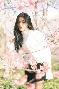 Elegant Beauty Amidst Blooming Cherry Blossoms | A Gentle Girl Evoking Fresh Spring Emotions - image 5