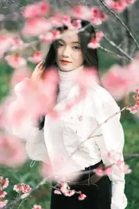 Elegant Beauty Amidst Blooming Cherry Blossoms | A Gentle Girl Evoking Fresh Spring Emotions - image 0