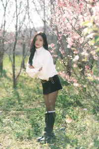 Elegant Beauty Amidst Blooming Cherry Blossoms | A Gentle Girl Evoking Fresh Spring Emotions - image 4