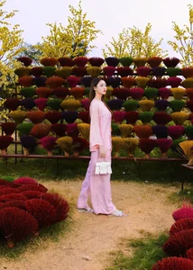 Miss Luong Thuy Linh Stuns in Traditional Ao Dai on the Tennis Court - image 2