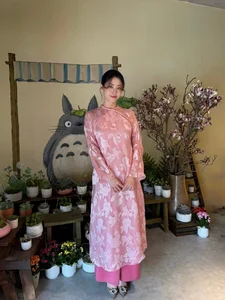 Miss Luong Thuy Linh Stuns in Traditional Ao Dai on the Tennis Court - image 3