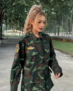 Xoài Non Stuns in Military Uniform and Barbie-Like Visuals for Sao Nhập Ngũ 2024 - image 0