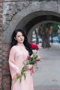 Discover the Elegant Charm of Vietnamese Beauty in a Pink Ao Dai by the Serene Lake - image 9