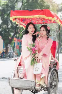 Discover the Elegant Charm of Vietnamese Beauty in a Pink Ao Dai by the Serene Lake - image 3