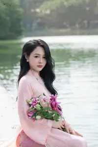 Discover the Elegant Charm of Vietnamese Beauty in a Pink Ao Dai by the Serene Lake - image 7