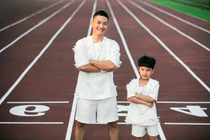 Vietnamese Pop Star Dam Vinh Hung and His Son Charm in New Fashion Shoot - image 6