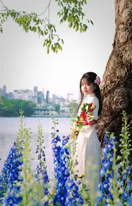 Graceful Vietnamese Girl in White Ao Dai Shines with Traditional Beauty in Old Quarter - image 6