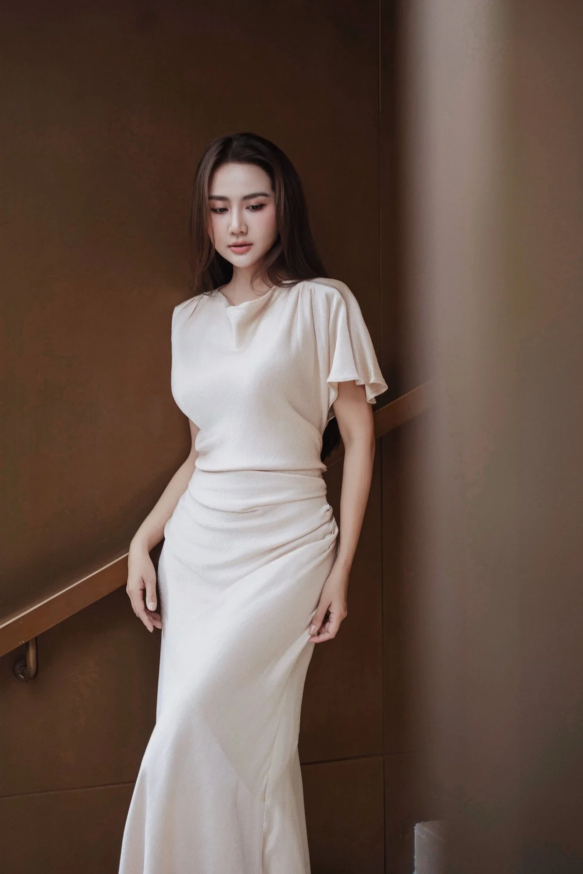Huyen Lizzie Radiates Elegance in Traditional Ao Dai Street Style