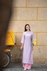 Huyen Lizzie Radiates Elegance in Traditional Ao Dai Street Style - image 10