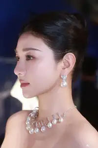 Radiant in Blue: A Woman's Elegant Charm Shines Bright in a Luxurious - image 5