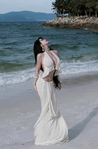 Saigon Influencer Vo Ngoc Tran Stuns in Bold Cut-Out Beach Dress Fashion - image 8