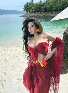 Saigon Influencer Vo Ngoc Tran Stuns in Bold Cut-Out Beach Dress Fashion - image 0