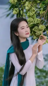 VGU No.172: Captivating Vietnamese Ao Dai Student in a Dreamy Moment, Showcasing Pure Grace Amidst Nature. - image 2