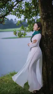 VGU No.172: Captivating Vietnamese Ao Dai Student in a Dreamy Moment, Showcasing Pure Grace Amidst Nature. - image 9