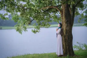 VGU No.172: Captivating Vietnamese Ao Dai Student in a Dreamy Moment, Showcasing Pure Grace Amidst Nature. - image 5