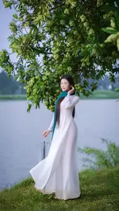 VGU No.172: Captivating Vietnamese Ao Dai Student in a Dreamy Moment, Showcasing Pure Grace Amidst Nature. - image 6