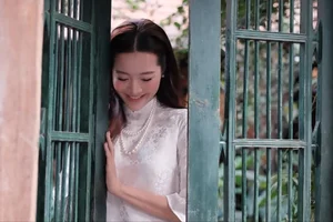 Karen Nguyen radiates timeless elegance in a pure white traditional Ao Dai - image 9