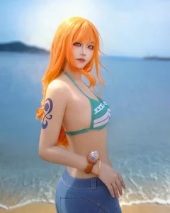 110+ Best Nami Cosplays: Capturing the Beautiful Navigator of One Piece - image 24