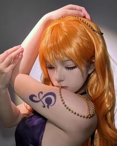 110+ Best Nami Cosplays: Capturing the Beautiful Navigator of One Piece - image 38