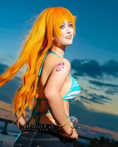 110+ Best Nami Cosplays: Capturing the Beautiful Navigator of One Piece - image 28