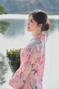 Elegant Asian Beauty: Graceful Woman in Modern Ao Dai by Serene Lakeside - image 4