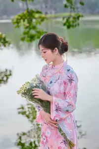 Elegant Asian Beauty: Graceful Woman in Modern Ao Dai by Serene Lakeside - image 7