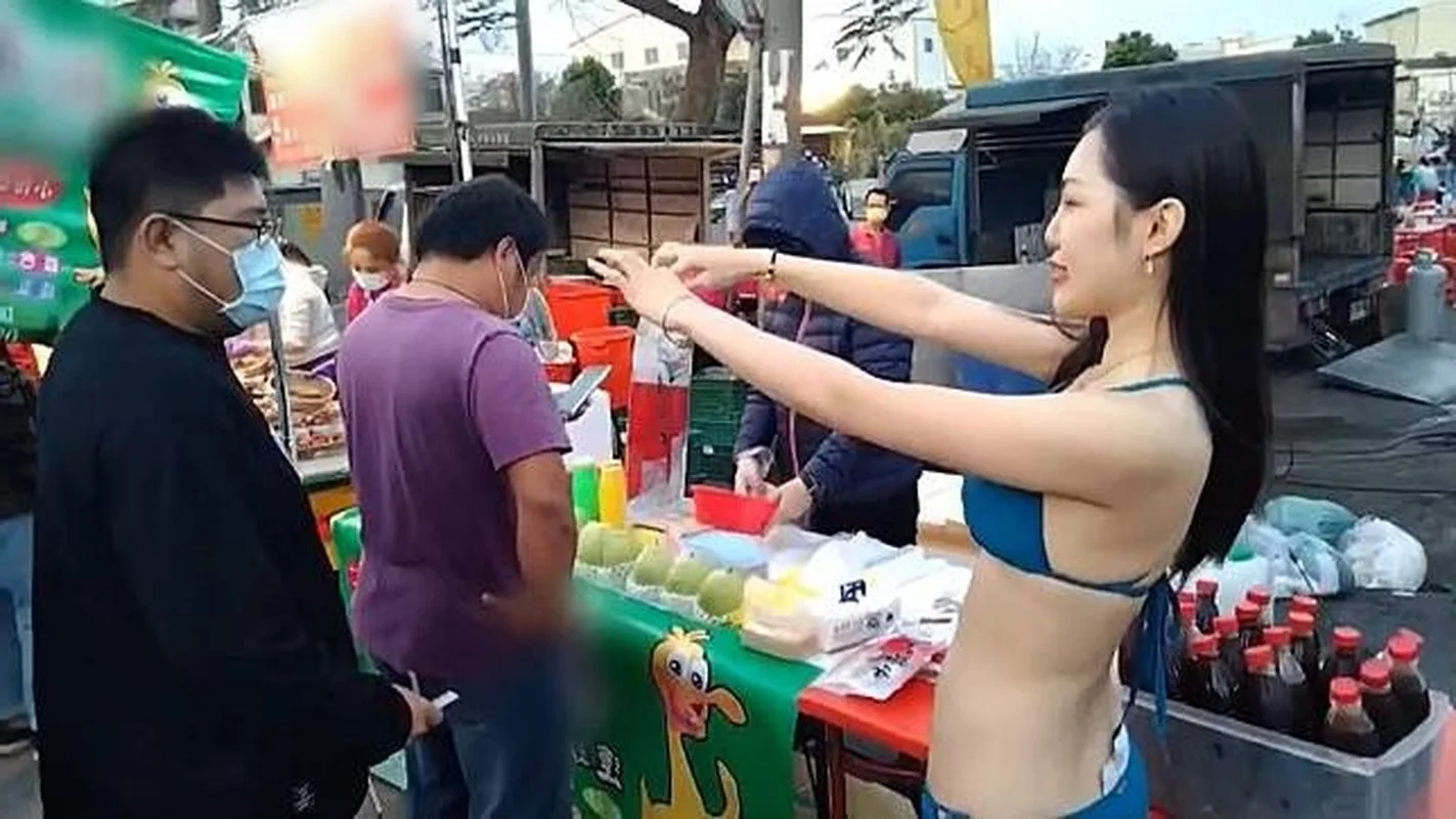 Guangdong Milk Tea Owner Sparks Debate with Bold Cheongsam