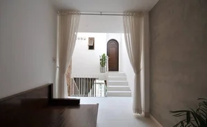 Stunning Saigon Townhouse Renovation: Modern Architecture Meets Urban Living - image 0