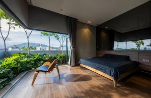 Urban Oasis: A Green Townhouse That Feels Like a Resort - image 0