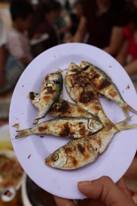 Traditional Grilled Herring: The Coastal Delicacy Earning Millions Daily - image 0