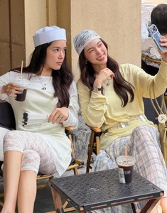 Bua Nalinthip Showcases Timeless Beauty During Vibrant Visit to Ben Thanh Market with Thai Stars - image 0