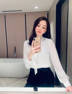 The Beautiful Bac Lieu Secretary Turning Heads with Chic Crop Top Styles - image 2