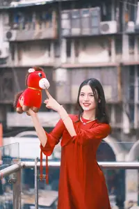 Vietnamese Girl's Bright Smile with Lucky Plush Horses in a Traditional Market. - image 4