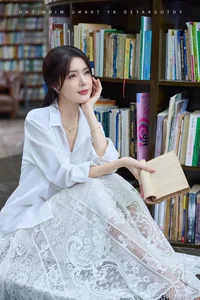 Lilly Luta Captivates Fans with Pure and Elegant White Shirt Photoshoot - image 3