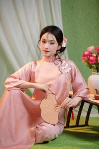 Elegant Muse in Pastel Pink Traditional Attire - image 3