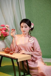 Elegant Muse in Pastel Pink Traditional Attire - image 2