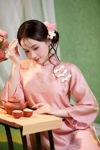 Elegant Muse in Pastel Pink Traditional Attire - image 1