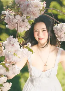 Spring Muse: Pristine Beauty and Grace Amidst Blooming Cherry Blossoms. - image 2