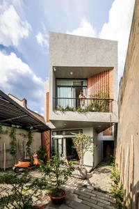 Innovative Z-Shaped Townhouse Design Optimizes Light and Feng Shui - image 1