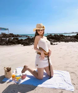 Huyen Baby radiates elegance in chic beachwear with a stunning summer vibe - image 1