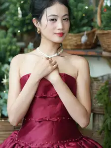 VGU No.187: Charming Woman in Red Dress Shines with Elegant Christmas Style. Discover Festive Fashion & Holiday Grace! - image 12