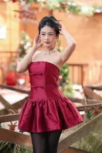 VGU No.187: Charming Woman in Red Dress Shines with Elegant Christmas Style. Discover Festive Fashion & Holiday Grace! - image 2