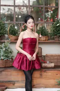 VGU No.187: Charming Woman in Red Dress Shines with Elegant Christmas Style. Discover Festive Fashion & Holiday Grace! - image 1
