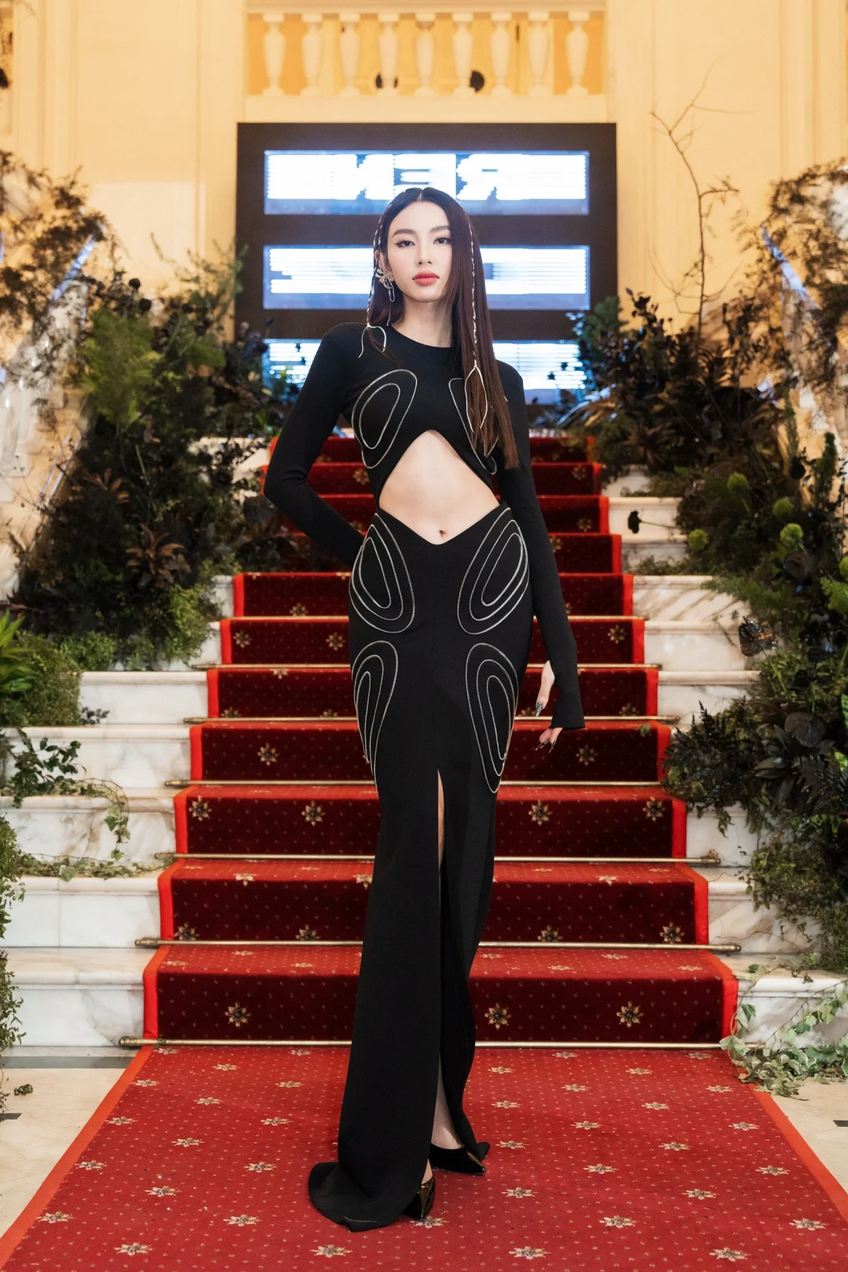 Thuy Tien and Diem My 9X Dazzle in Bold Cutout Gowns on the Red Carpet