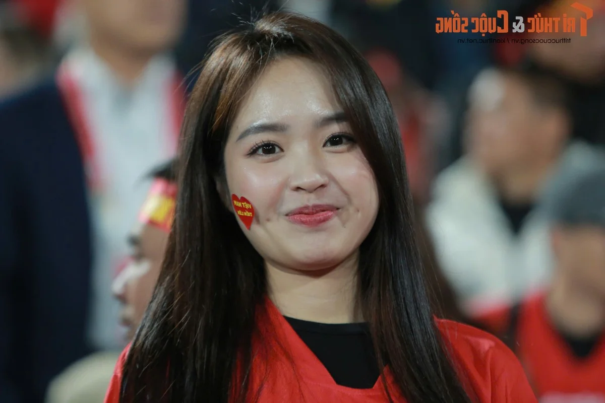 Hanoi Beauty Steals the Spotlight While Cheering for the Vietnam National Football Team