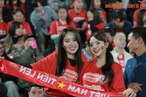 Hanoi Beauty Steals the Spotlight While Cheering for the Vietnam National Football Team - image 0