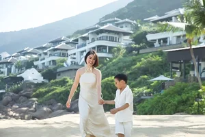 Thuy Tien and Son Mathis Enjoy Wholesome Beach Day - image 2